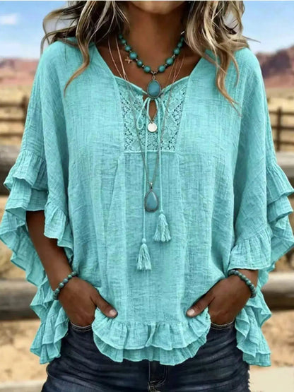 Full Size Tassel Tie Neck Ruffled Hem Blouse Plus Size - Bitsy Gypsy Boutique