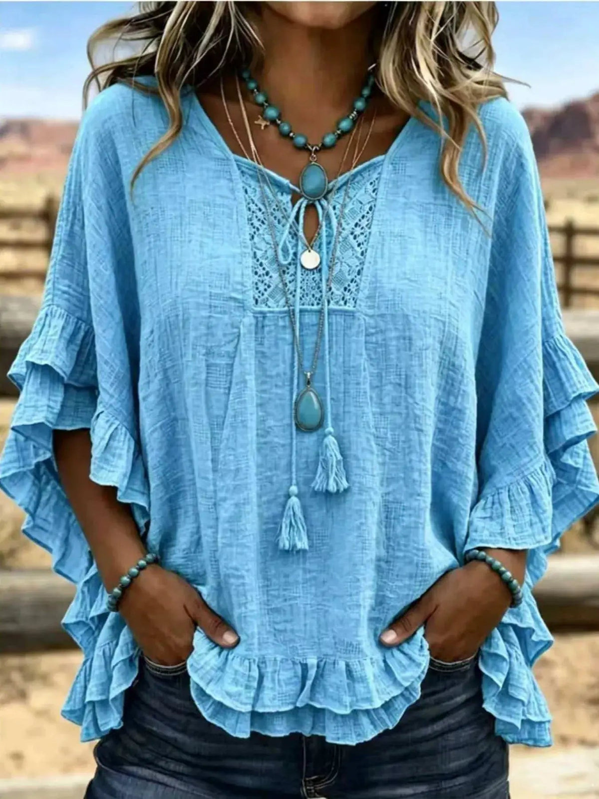 Full Size Tassel Tie Neck Ruffled Hem Blouse Plus Size - Bitsy Gypsy Boutique