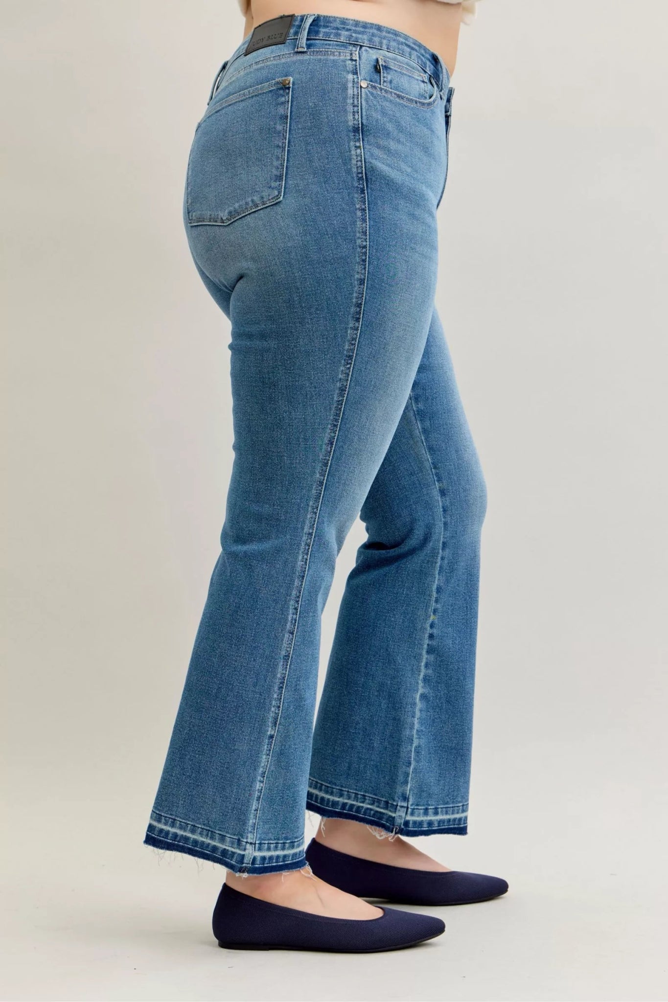 Judy Blue Full Size Mid Rise Slim Bootcut Tummy Control Release Hem Jeans Plus Size - Bitsy Gypsy Boutique