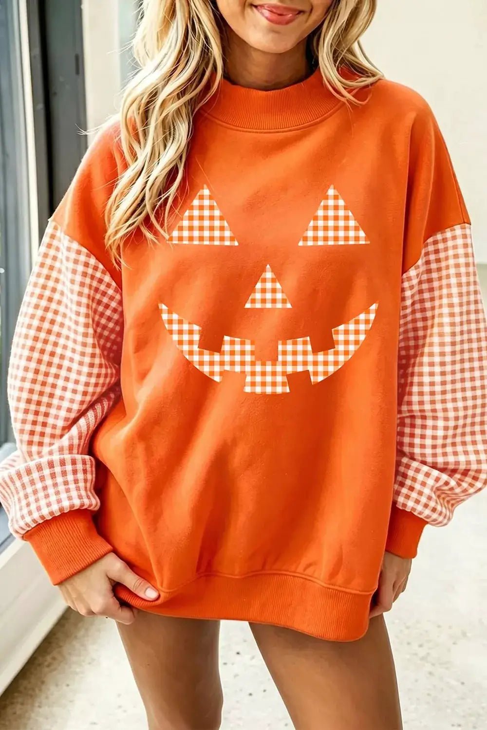 Plaid Sleeve Halloween Pumpkin Face Graphic Sweatshirt - Bitsy Gypsy Boutique