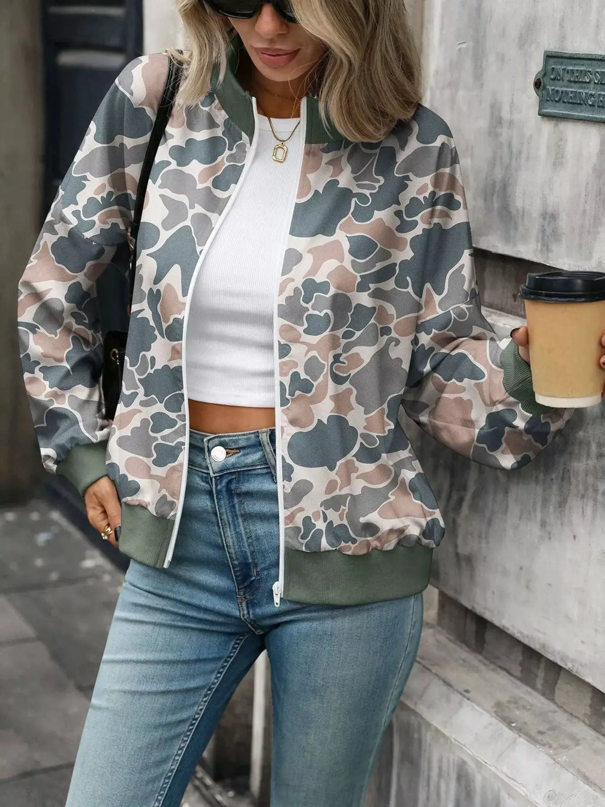 Printed Zip Up Long Sleeve Sweatshirt by Trendsi