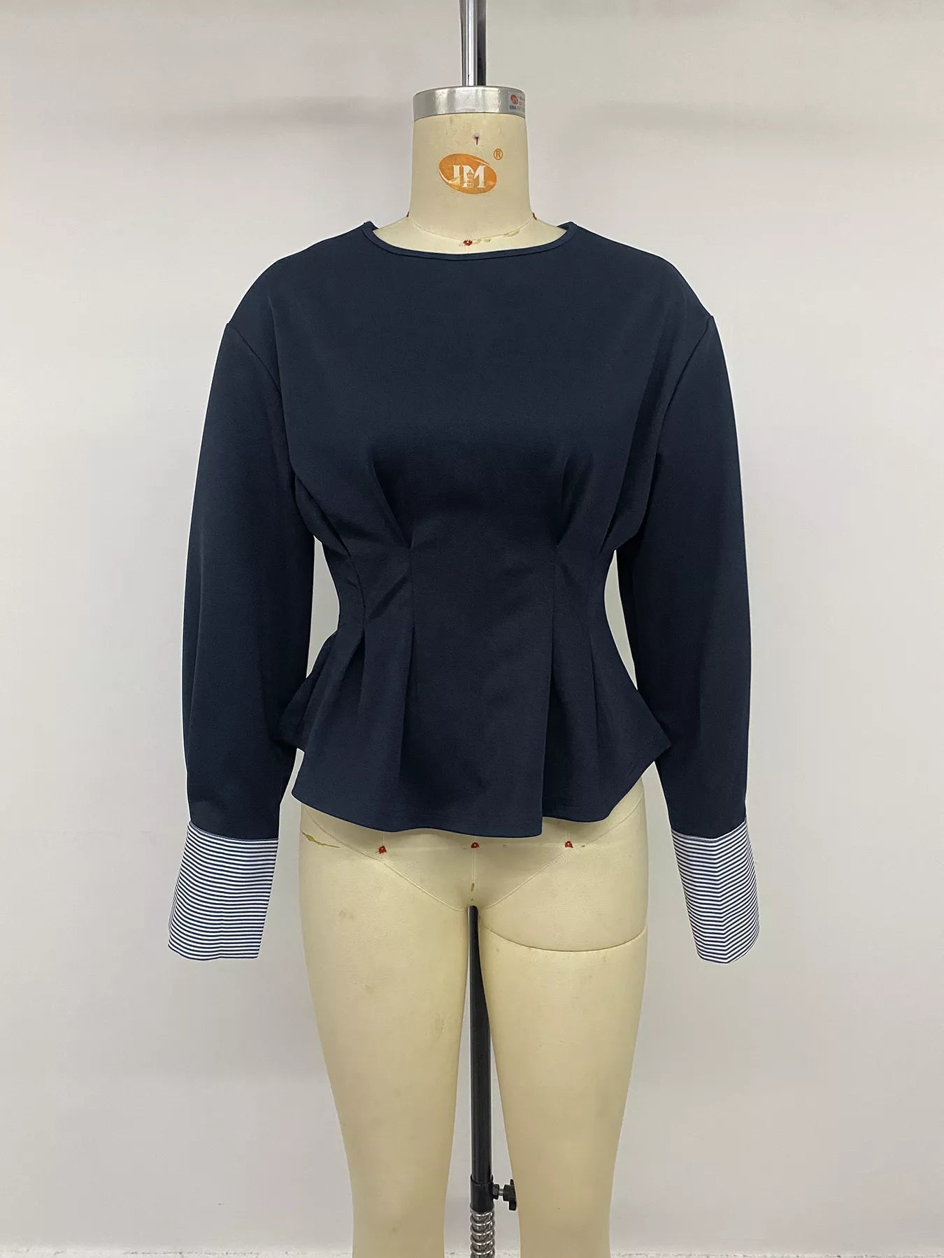 Round Neck Peplum Top with Striped Cuffs - Bitsy Gypsy Boutique