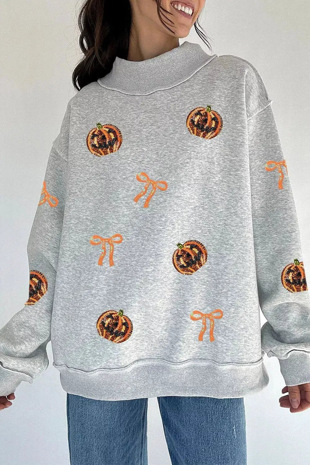 Sequin Pumpkin Face Bow Exposed Seam Halloween Sweatshirt - Bitsy Gypsy Boutique