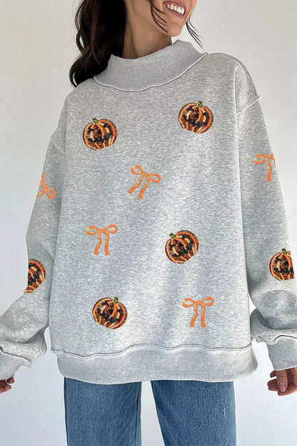 Sequin Pumpkin Face Bow Exposed Seam Halloween Sweatshirt - Bitsy Gypsy Boutique