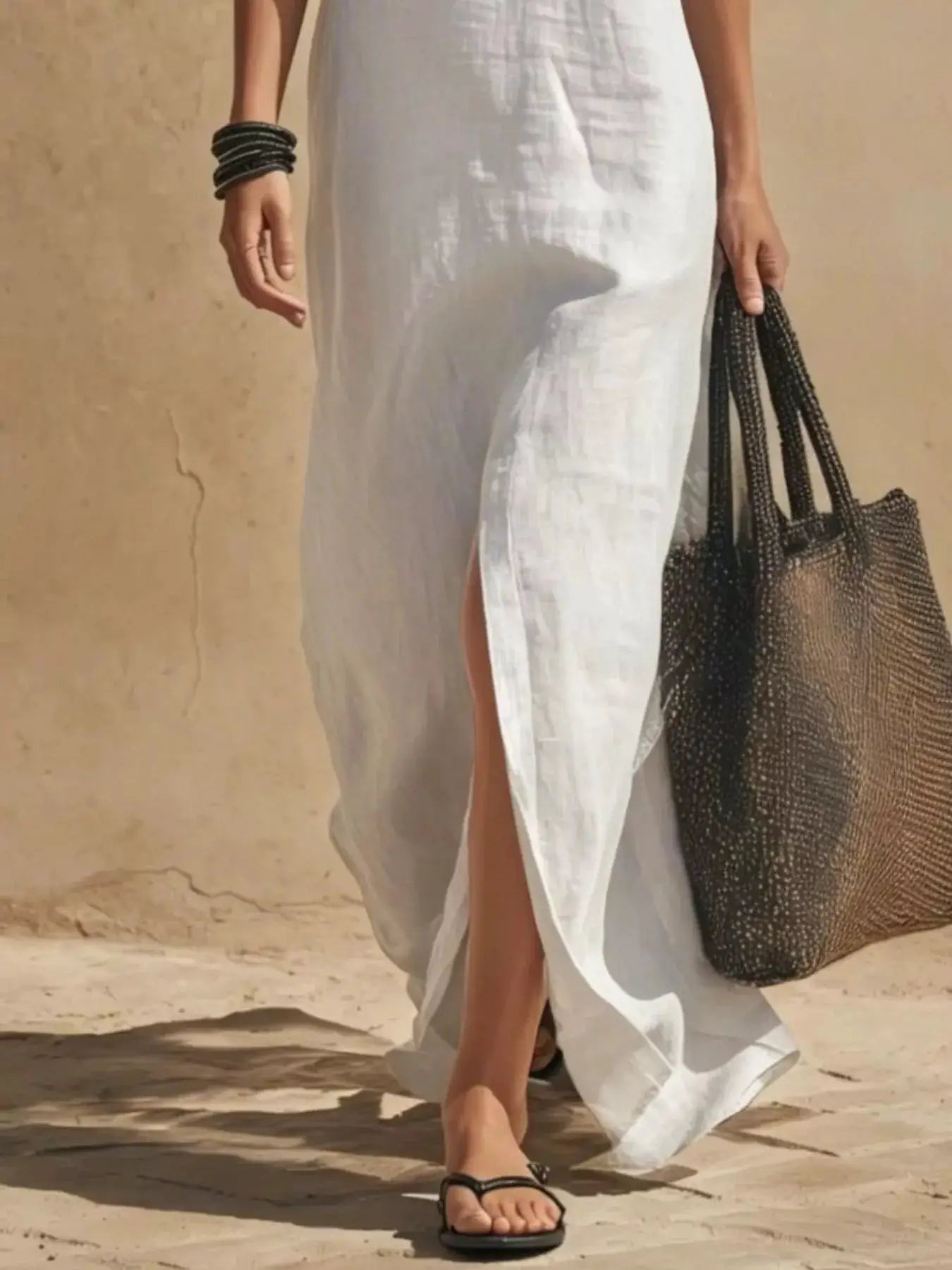 Slit Front Spaghetti Strap Maxi Dress by Trendsi
