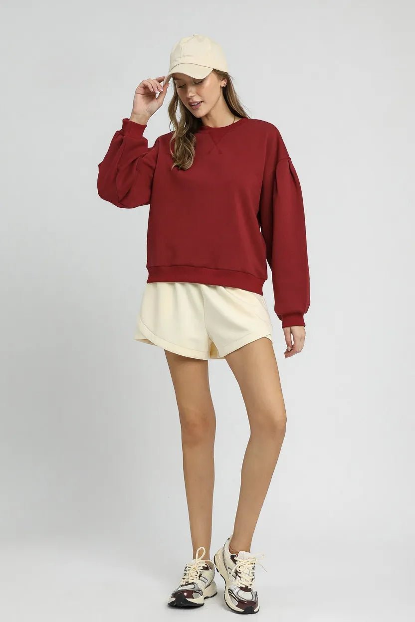 Umgee Round Neck Sweatshirt with Pleated Detail - Bitsy Gypsy Boutique