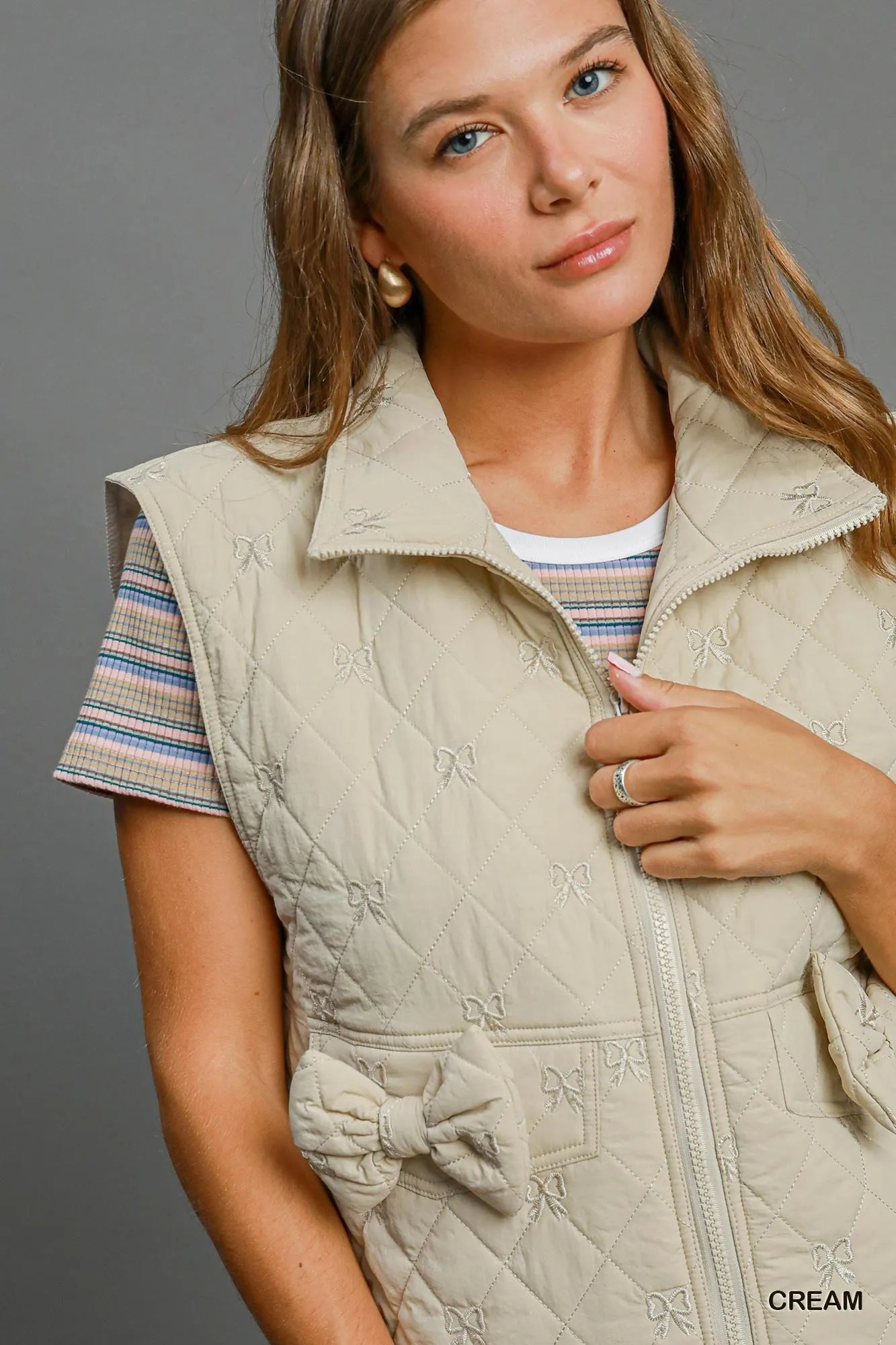 Umgee Sleeveless Quilted Vest with Bow Details - Bitsy Gypsy Boutique